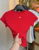 Camiseta Sencilla de Color Sólido con Cuello Redondo y Manga Corta para Mujer 2026 Estilo Coreano Moda Ajustada Top en Rojo Ankara