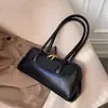 Bolso de hombro a la moda y versátil con asa de mano, de alta gama