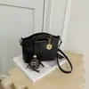 Bolso pequeño transfronterizo, súper popular para mujer, nueva colección 2026, diseño de nicho, bolso de hombro tipo cubo elegante y versátil, bolso de hombro y bolso cruzado