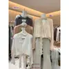 AS OFICIAL Outono Feminino Estilo Casual Francês Renda Transparente Perolada Fita Decote V Manga Longa Blusa 28851
