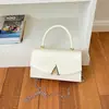 2026 Gran Capacidad Casual Color Sólido Primavera/Verano Nuevo Diseño Personalizado Moda Tendencia Cadena Bolso de Mano Bolso Cruzado Pequeño Cuadrado