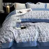 Juego de cuatro piezas de seda lavada con tacto fresco de verano, funda nórdica de seda helada, sábana y sábana bajera de Tencel sedosas y lisas estilo europeo para dormir desnudo