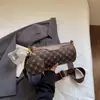 Bolsa de nicho de alta qualidade para mulheres, nova bolsa de ombro da moda 2026, versátil para o dia a dia, alça de ombro larga, bolsa cilíndrica crossbody