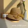 Nuevo sombrero de paja decorado con lazo para mujer, sombrero de sol versátil de ala ancha para salidas de vacaciones de verano en la playa