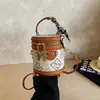 2026 Mini Bolsa Cilíndrica Estilo Lv Floral Vintage Transfronteiriça Moda Tendência Corrente Transversal Bolsa Balde
