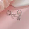 Corea del Sur Dongdaemun Brillo Estelar Estrella Hebilla Oreja Moda Femenina Estrella Hueca Diamante Pendientes Comercio Exterior Transfronterizo Nuevo