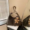 Bolso Retro para Commuter para Mujer 2026 Otoño/Invierno Nuevo Estilo de Alta Gama Casual Versátil Moda Bolso de Hombro de Gran Capacidad