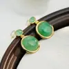 Pendientes de botón Huibao de plata S925 con cabujón de esmeralda africana, elegantes, sencillos, versátiles, de alto nivel, para temperamento, de mujer