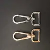 Fábrica en stock al por mayor hebilla de bolsa anillo hebilla de hardware gancho de metal gancho de placa de 6 puntos color todo equipaje viaje
