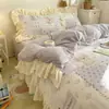 Conjunto de Quatro Peças em Lã de Leite Classe A Estilo Coreano Desenho Estampado de Renda Capa de Edredom Francesa Lençol de Cama Conjunto de Três Peças para Dormitório Flanela