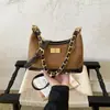 Bolsa tote transversal com padrão de diamante de nicho transfronteiriça, nova bolsa casual para o dia a dia sob o braço, bolsa de ombro com corrente de patchwork da moda para mulheres