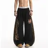 Pantalones de chándal casuales holgados de pierna ancha con estampado de leopardo, estampado de letras y rayas, estilo callejero americano, subcultura, para hombres y mujeres
