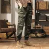 Pantalones de Montañismo a Prueba de Viento para Exteriores Estilo Retro Americano Primavera Otoño Invierno Bolsillos Múltiples Ropa de Trabajo Pantalones Deportivos para Hombre Pantalones Sueltos Cónicos