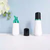 En stock botella cónica blanca de espuma de 60 ml, botella espumadora de PET para mousse de 100 ml, dispensador portátil de espuma facial