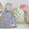 Pequeña bolsa de almacenamiento de algodón popelina floral con cordón bolsa de tela venta al por mayor de fábrica