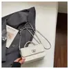 Bolso Pequeño Cuadrado Estilo Coreano Ins para Mujer 2026 Nuevo Modelo Bolso de Hombro con Hebilla de Cierre Estilo Coreano Bolso Cruzado Bolso de Mano Color Sólido para Viajes Cotidianos