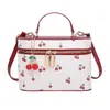 Bolsa de mão quadrada pequena estilo doce popular deste ano para mulheres, novo modelo outono 2026, bolsa de ombro cereja color-blocking, bolsa transversal da moda