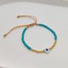 Estilo Étnico Ins Niche Ojos de la Suerte Cuentas de Vidrio Tejido Cuerda de Mano con Cuentas Combinable Cuentas de Arroz Coloridas Pulsera Pequeña para Mujer