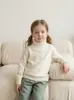Nuevo suéter de lana para niños otoño e invierno 2026, suéter de punto de cuello alto estilo coreano, unisex, suéter cálido de capa base