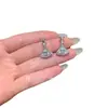 Venta al por mayor de fábrica pequeño camote natural material peligroso azul jade agua colgante de falda s925 plata incrustado diseño pequeño y fresco