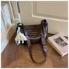 Bolso minimalista de nicho retro para el día a día, bolso cruzado para mujer, nuevo bolso de hombro de moda 2026, versátil para el trabajo y el transporte