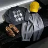 Conjunto Fresco de Moda para Niños Otoño 2026 Nuevo Estilo Coreano Estilo Academia Infantil Pantalones de Punto Retro a Cuadros