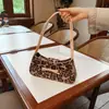 Bolso Baguette Niche Elegante de Moda con Lazo de Leopardo Francés Nuevo Casual para Combinar con Todo Bolso de Hombro Bajo el Brazo para Mujer