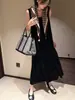 Nuevo conjunto de falda larga tipo cola de pez de terciopelo estilo coreano de Lino para mujer 2026, moderno y elegante, holgado y adelgazante