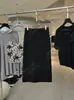 Yuran 26 Colección Primavera/Verano Nuevo Conjunto de Top de Punto de Manga Corta y Falda de Hilo de Bucle de Algodón con Encaje Hueco Francés de Burbujas