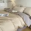 Juego de ropa de cama de lujo de cuatro piezas de algodón de fibra larga de 80 hilos, sábana bajera 100% algodón, funda de edredón bordada, juego de tres piezas de alta gama
