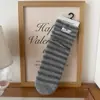 Calcetines versátiles Peijo estilo coreano florales de media pantorrilla, calcetines de encaje con volantes estilo universitario otoño/invierno, calcetines de algodón puro para mujer Zhuji al por mayor