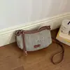 Bolsa Dumpling Simples e Moderna 2026 Verão Nova Moda Feminina para o Dia a Dia Transversal Casual Personalidade Bolsa de Ombro para Mulheres