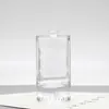 Frasco de Perfume Redondo de Vidro Branco Cristalino Material Cilíndrico, Frasco Recarregável, Frasco Transparente com Borrifador de Fundo Espesso, Frasco Cosmético Vazio de Encaixe