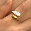 Anillo abierto blanco de acero inoxidable con goteo de aceite, anillo ajustable con curva irregular de gota de agua, joyería simple para el día a día