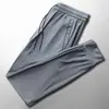 Pantalones de Seda de Hielo para Hombre Verano Delgados de Malla Pantalones de Aire Acondicionado Nueva Llegada Sueltos Casuales Talla Grande Color Sólido Pantalones con Cordón