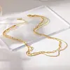 Cadena de Acero Inoxidable de Doble Capa con Cadena Cruzada Hueso de Serpiente, Chapada en Oro de 18K, Estilo de Lujo Ligero de Nicho para Mujeres, Cadena de Venta Caliente Transfronteriza