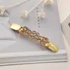 Broche Vórtice de Liga Europeu e Americano Retrô Fivela de Lenço Clipe de Suéter Botão de Conexão para Cardigã Clipe de Gola fabricantes atacado