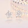 Pendientes sencillos coreanos de temperamento de moda, pendientes de copo de nieve para mujer, pendientes Mori con personalidad dulce, fabricantes de joyas para las orejas al por mayor