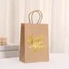 Bolsas de embalaje navideño al por mayor bolsas de papel de Acción de Gracias con estampado en bronce texto impreso bolsas de regalo fiesta papel kraft bolsas de compras