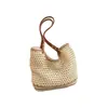 Bolso de mano tejido a mano artístico calado de nicho transfronterizo, bolso de hombro versátil, bolso de playa de gran capacidad para vacaciones junto al mar