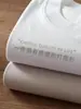 Camiseta Pesada Japonesa 300g Unissex Manga Longa Algodão Puro Caimento Solto Três Pontos Cor Sólida Original Base Branca para Outono e Inverno