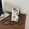 Bolsa de teléfono tejida color caqui de diseño nicho de verano para mujer, nuevo estilo 2026 bolso pequeño cuadrado de paja, bolso de hombro y cruzado