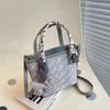 Bolso de Mano Sencillo y Elegante para Mujer 2024 Nueva Moda Estampado de un Solo Hombro Diseño de Nicho Cruzado Bolso Cubo Versátil