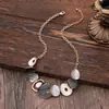 Colgante Largo Geométrico de Flor Hueca Esmaltada de Venta Caliente Transfronteriza Colgante de Collar Todo Fósforo de Corazón de Alta Calidad para Mujer