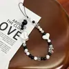 Cadena para Teléfono Móvil de Acrílico Blanca y Negra con Diseño de Corazón, Llavero para Funda de Teléfono Móvil, Colgante DIY, Correa para Teléfono Móvil para Mujeres