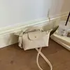 Bolsas de Designer de Nicho para Mulheres 2026 Novo Modelo Cor Sólida Versátil Bolsa Transversal Estilo Coreano Moda Camurça Pequena Bolsa de Mão