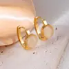 Pendientes Europeos y Americanos Geométricos Redondos Incrustados Imitación Turquesa Ojo de Gato Acero de Titanio Acero Inoxidable de Alta Gama Elegantes Modernos