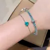 Electrochapado en Oro Real, Fuerte Retención del Color, Colgante de Corazón Azul Paraíba Simple y Exquisito, Pulsera Retráctil, Joyería con Forma de Corazón