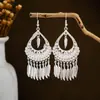 Pendientes estilo étnico borla largos minoría Miao pendientes de plata retro étnicos pendientes de viaje Miao mujer transfronterizos europeos y americanos