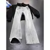 Jeans acampanados de corte oblicuo azul estilo high street americano para hombre, tendencia de verano versátiles lavados semi-elásticos rectos